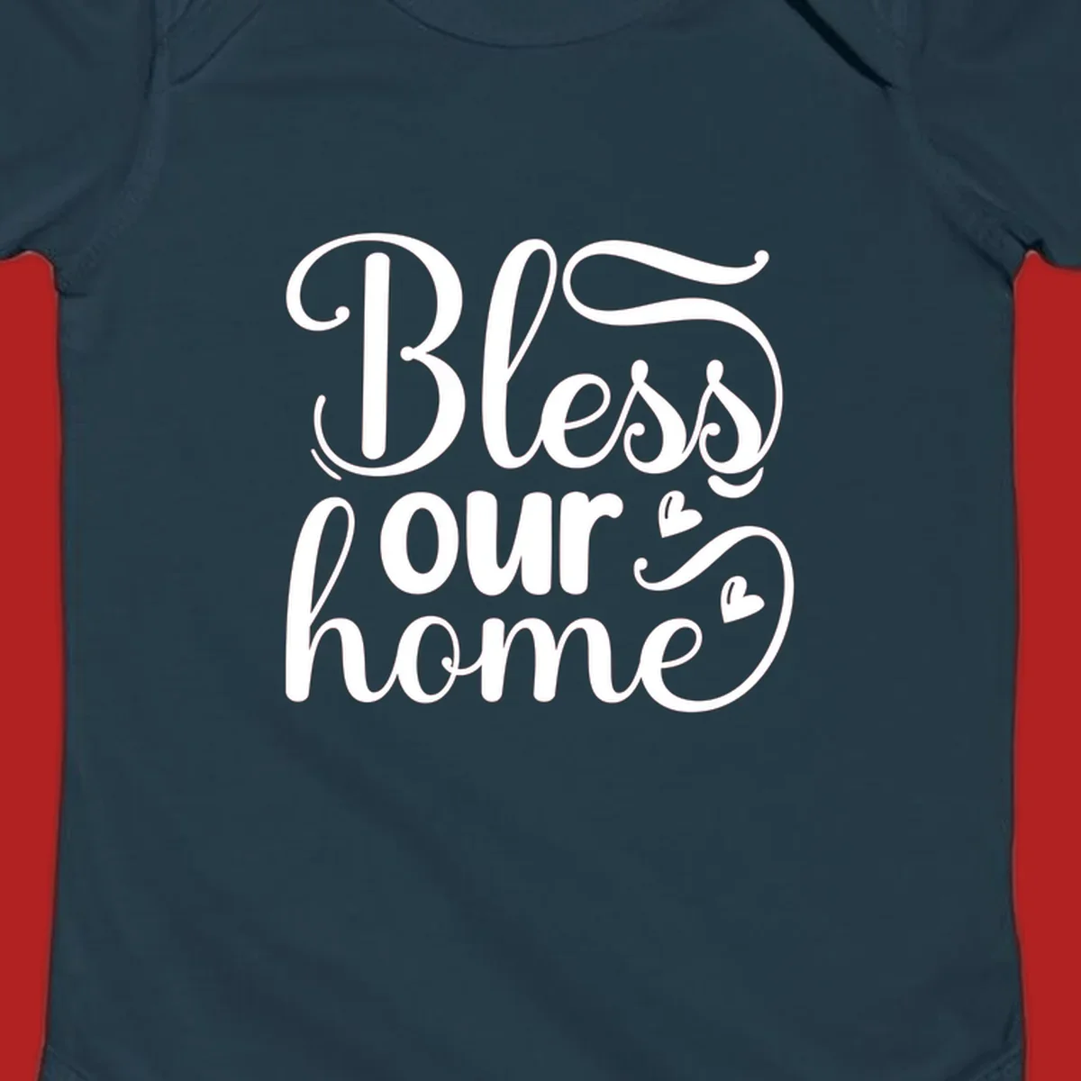 Bless our home script typography with hearts. White text on black and white backgrounds.