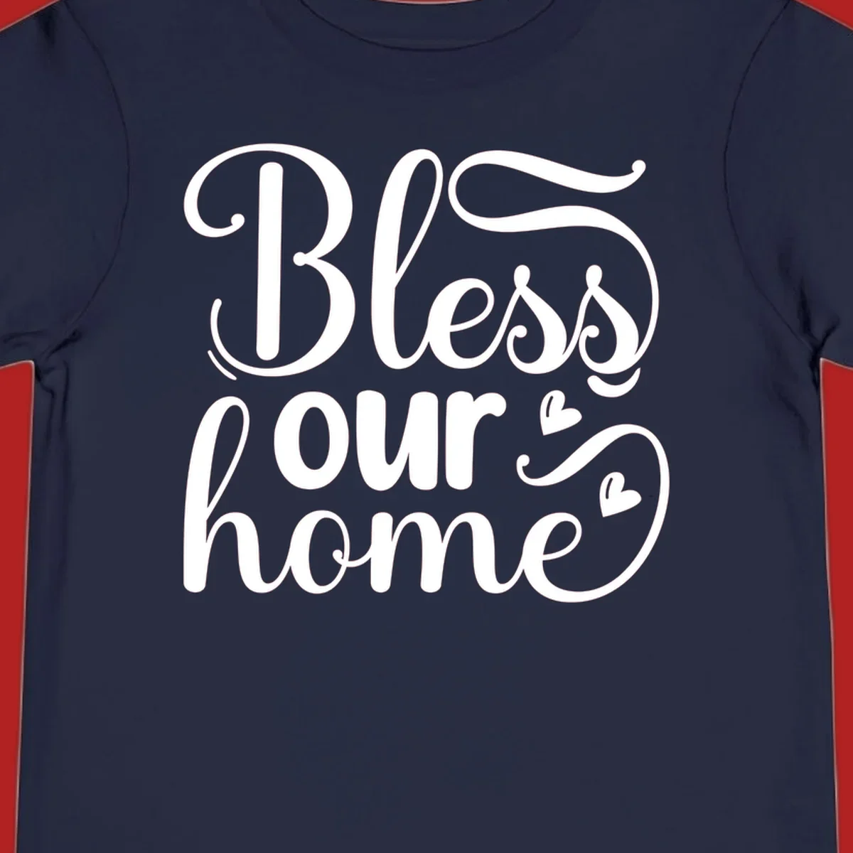 Bless our home script typography with hearts. White text on black and white backgrounds.