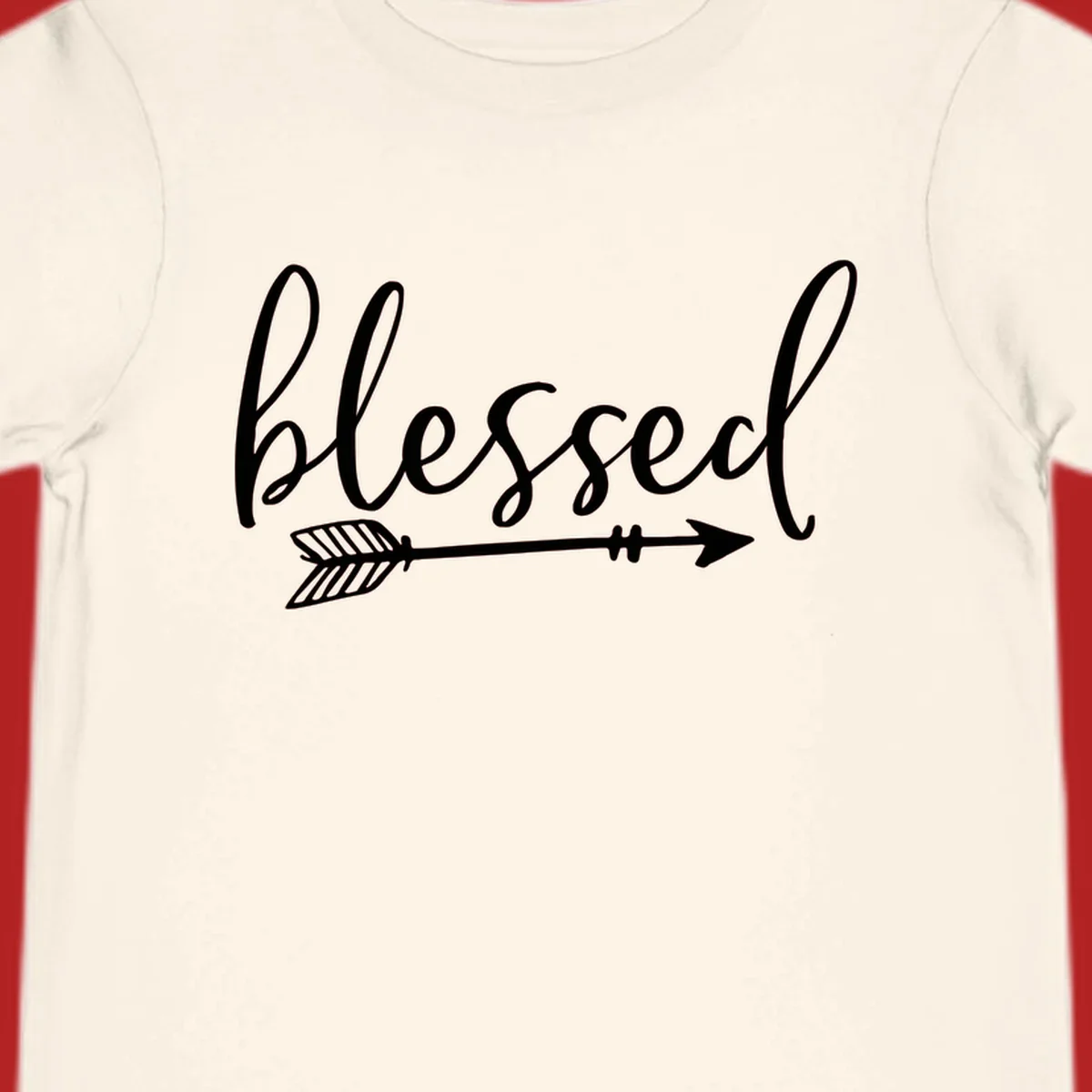 Blessed arrow script design with flowing text and an arrow graphic.
