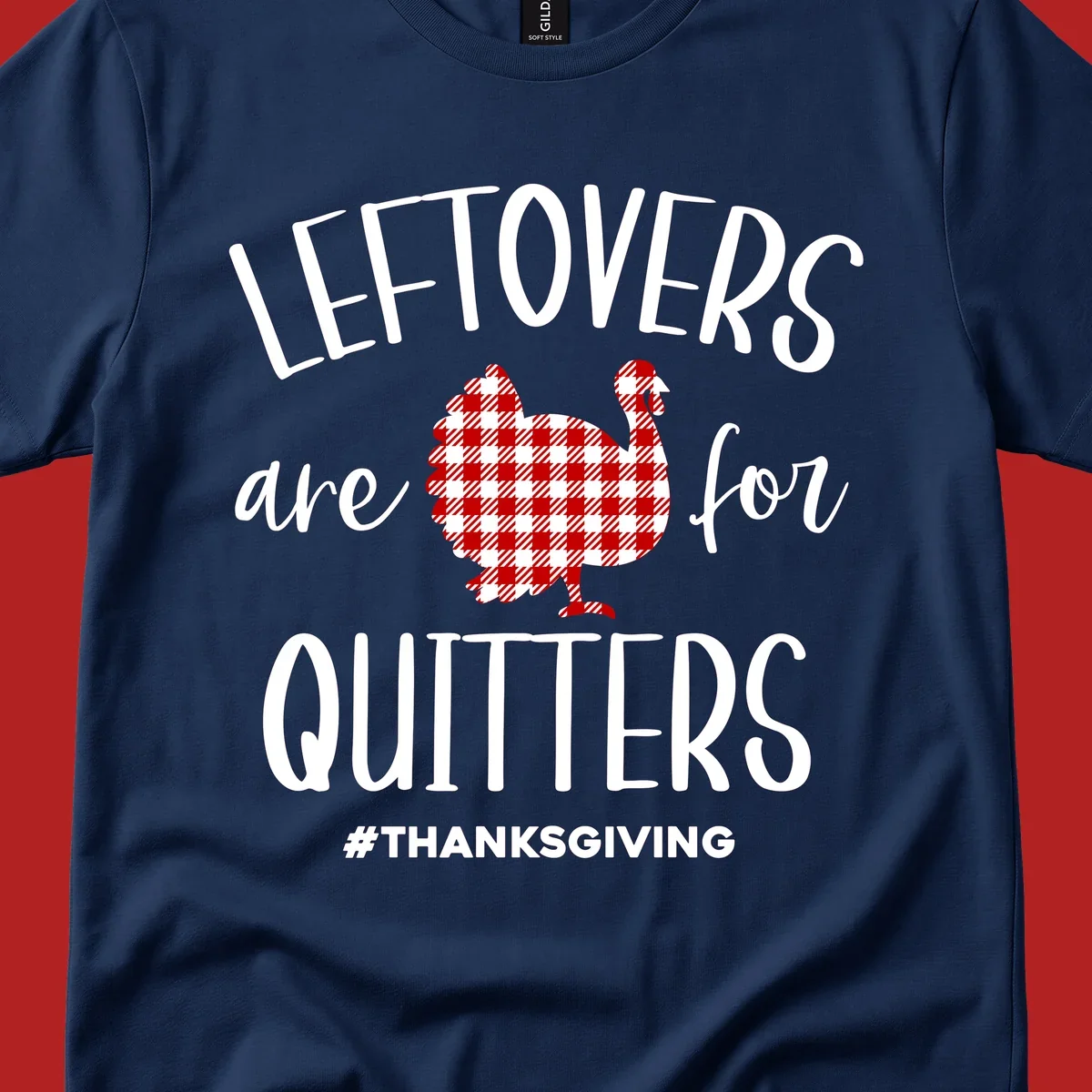 Leftovers are for quitters thanksgiving turkey graphic tee. White text, red and white gingham turkey.