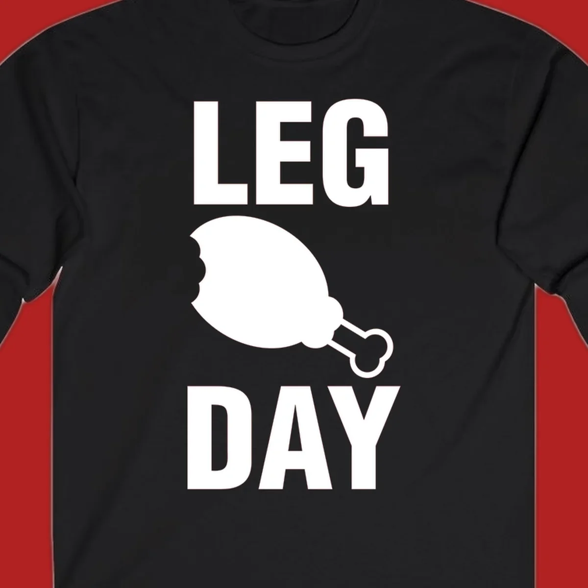 Bold text LEG DAY with a bitten chicken leg graphic in between.