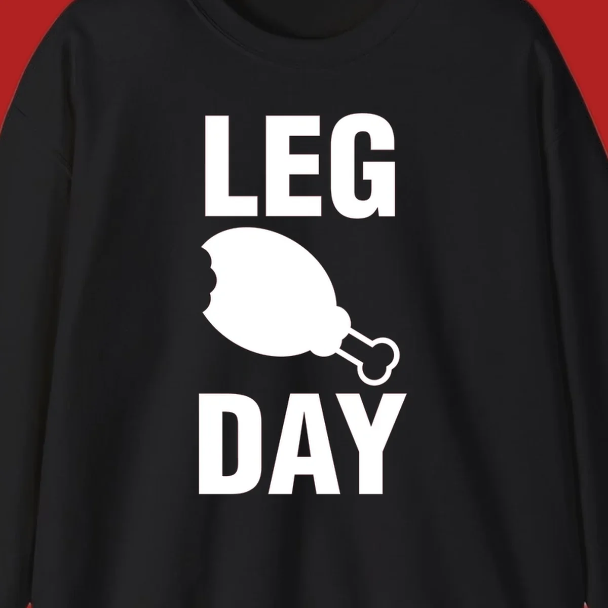 Bold text LEG DAY with a bitten chicken leg graphic in between.
