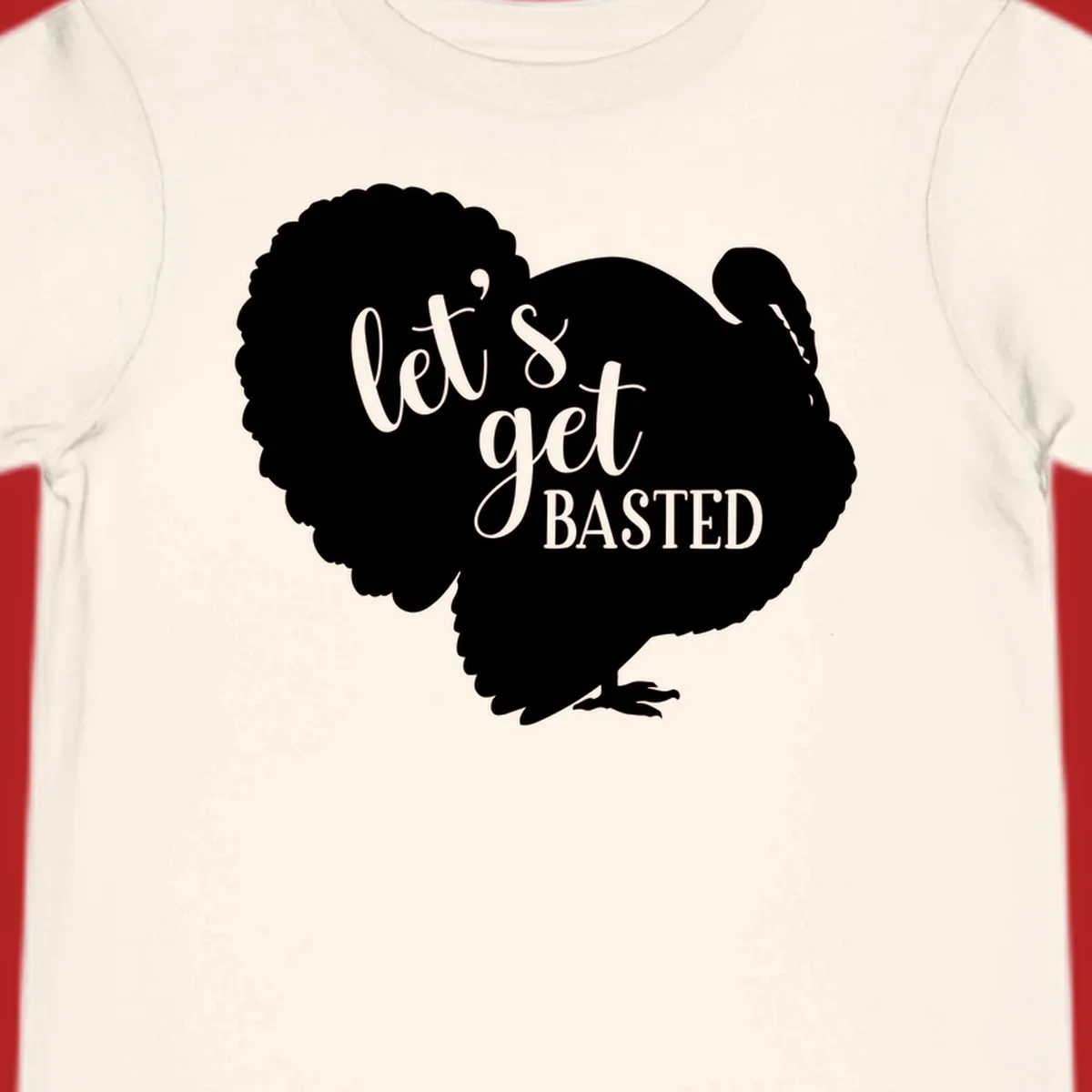 Thanksgiving turkey silhouette with text 'let's get BASTED', for holiday gatherings.