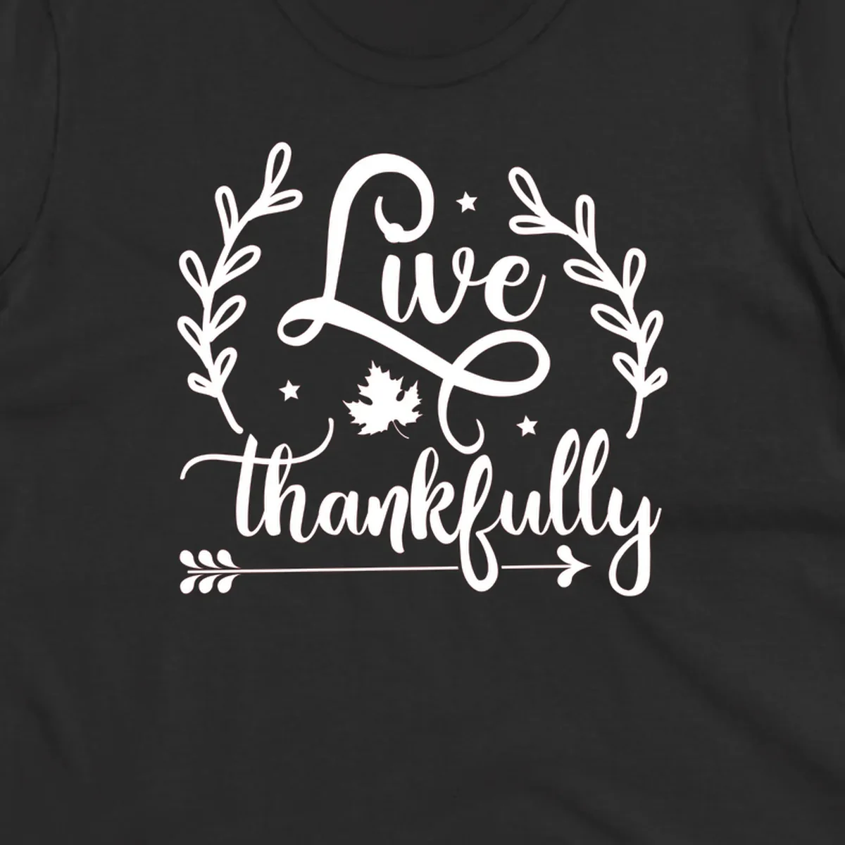 Live thankfully fall design with script text, leaves, and stars.