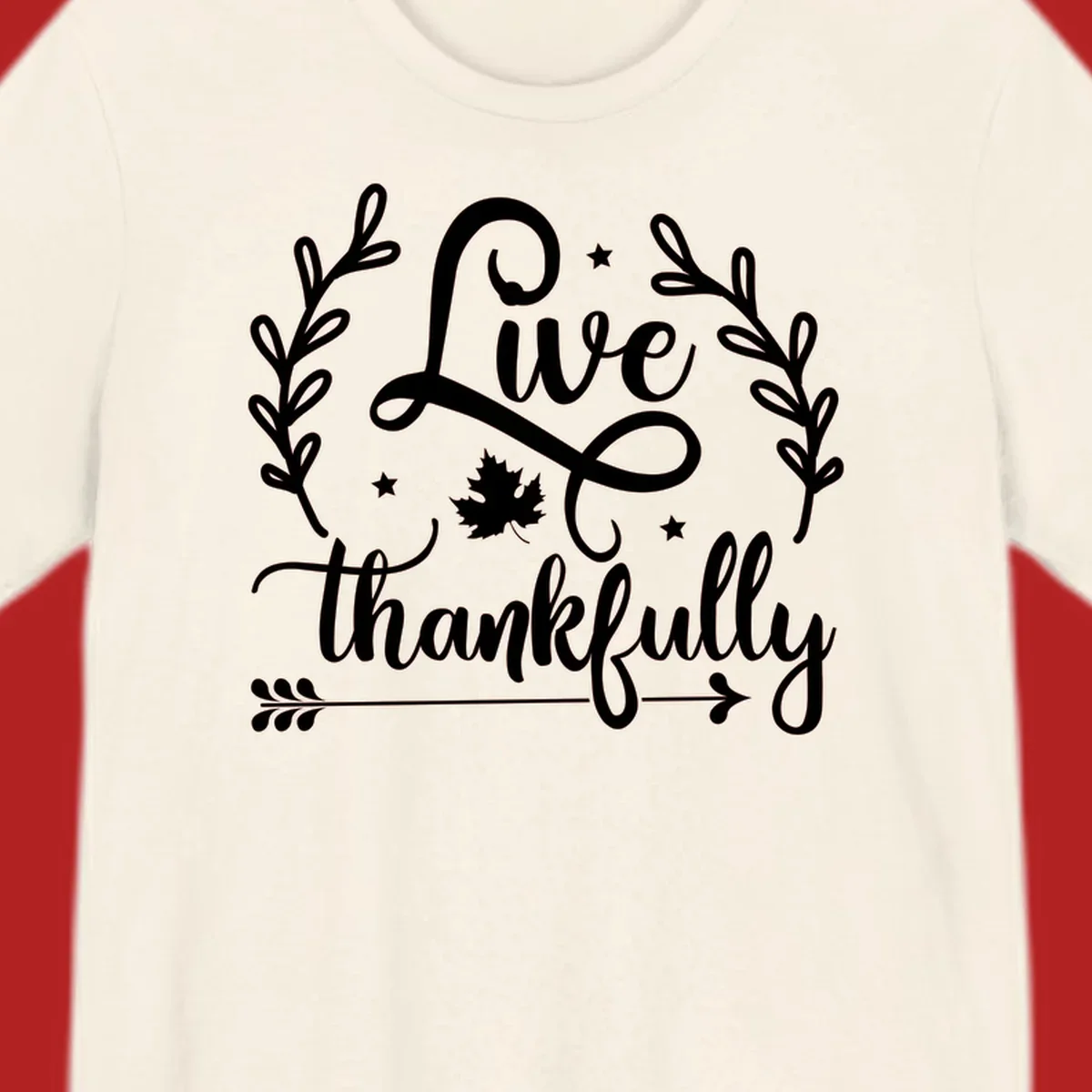 Live thankfully fall design with script text, leaves, and stars.