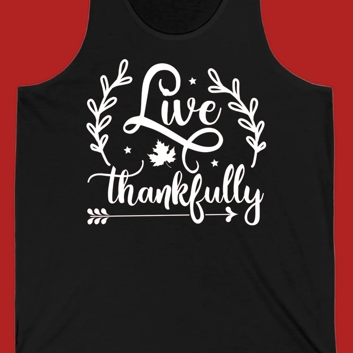 Live thankfully fall design with script text, leaves, and stars.