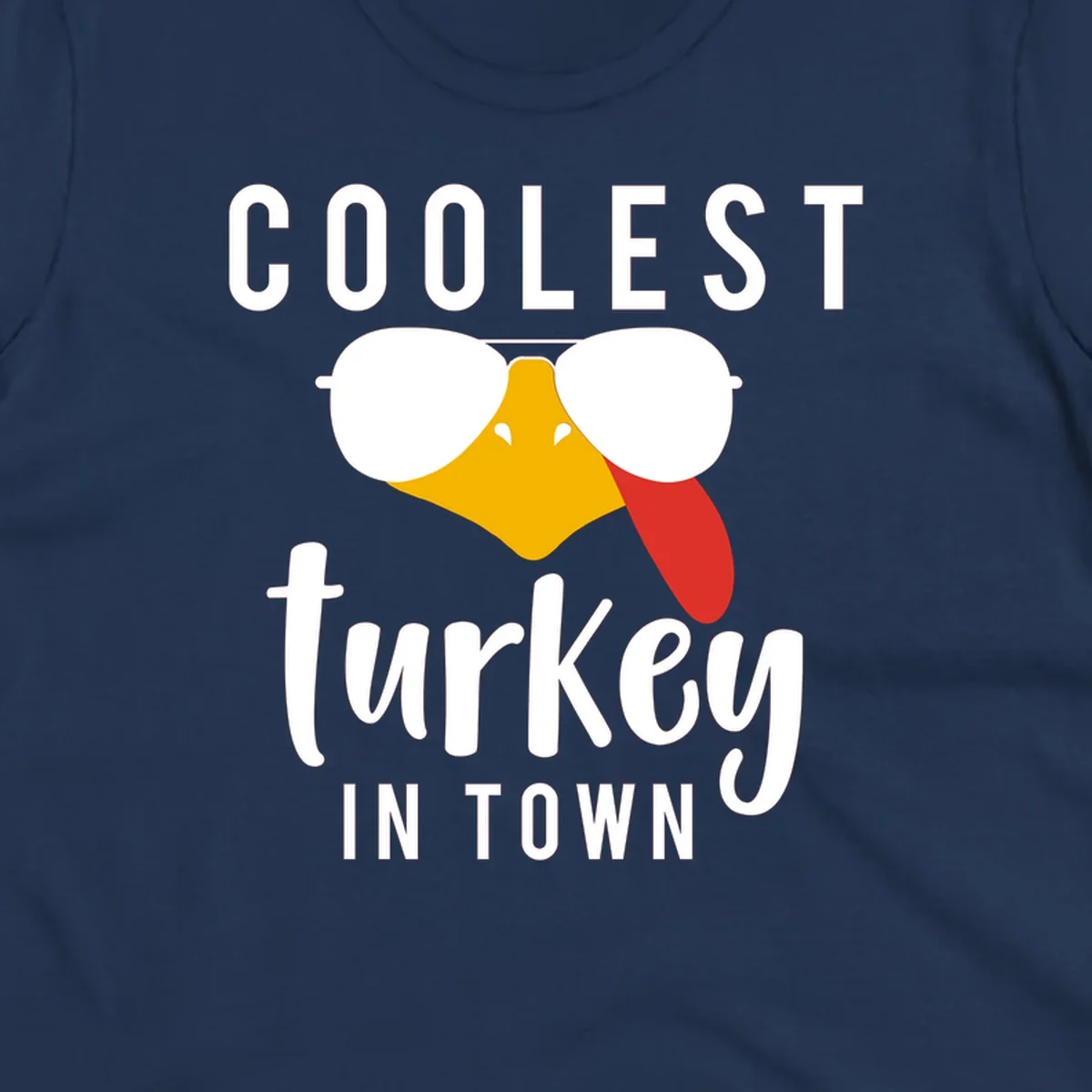 Coolest Turkey In Town Thanksgiving design with a cartoon turkey wearing sunglasses and sticking its tongue out.