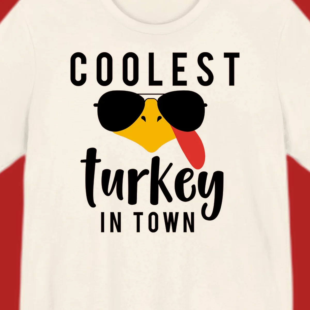 Coolest Turkey In Town Thanksgiving design with a cartoon turkey wearing sunglasses and sticking its tongue out.