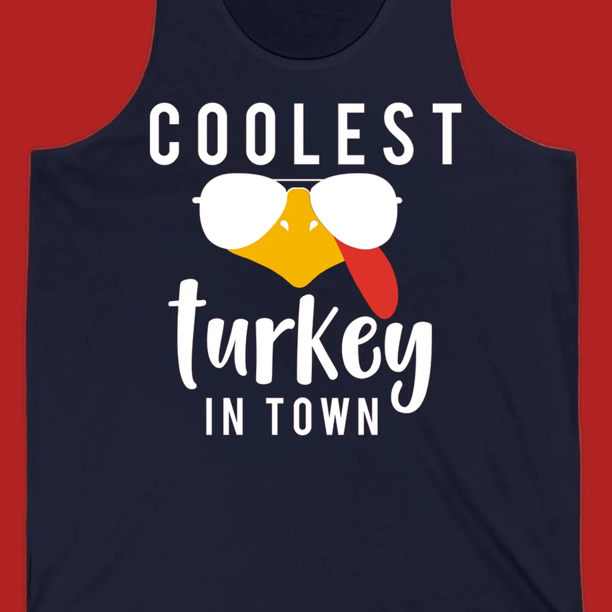 Coolest Turkey In Town Thanksgiving design with a cartoon turkey wearing sunglasses and sticking its tongue out.