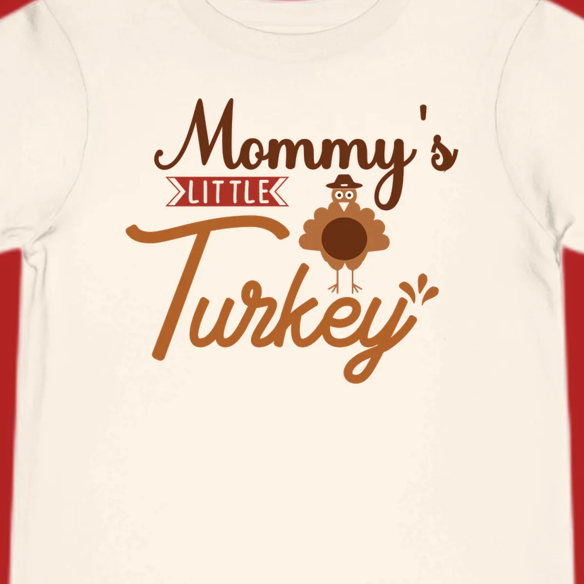 Mommy's Little Turkey Thanksgiving graphic with a cartoon turkey and playful text.