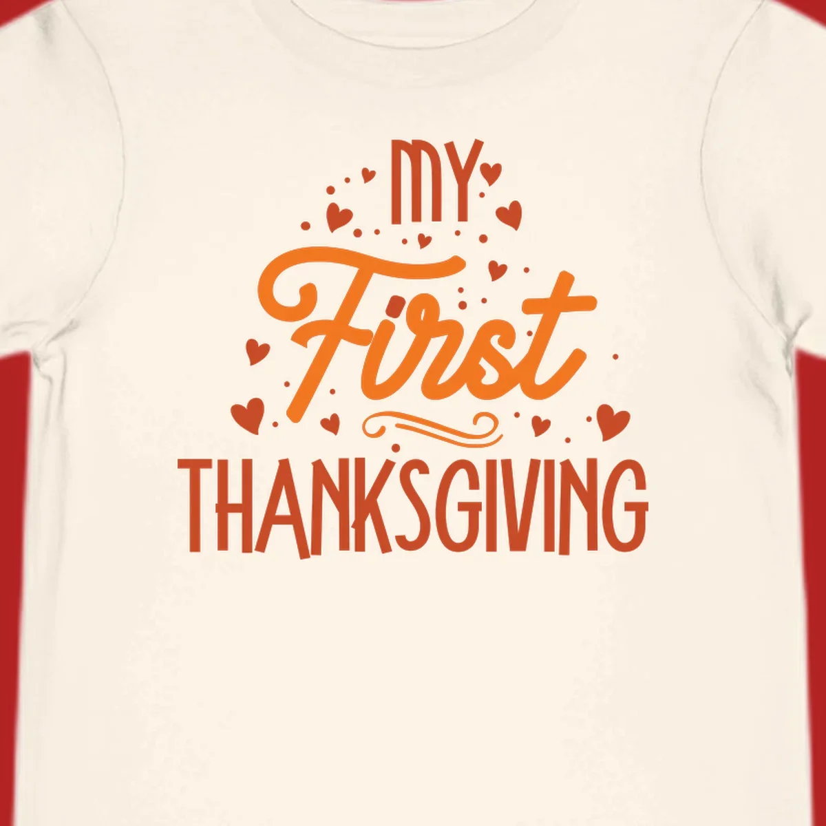 My First Thanksgiving text with hearts and dots illustration, for baby's first holiday.