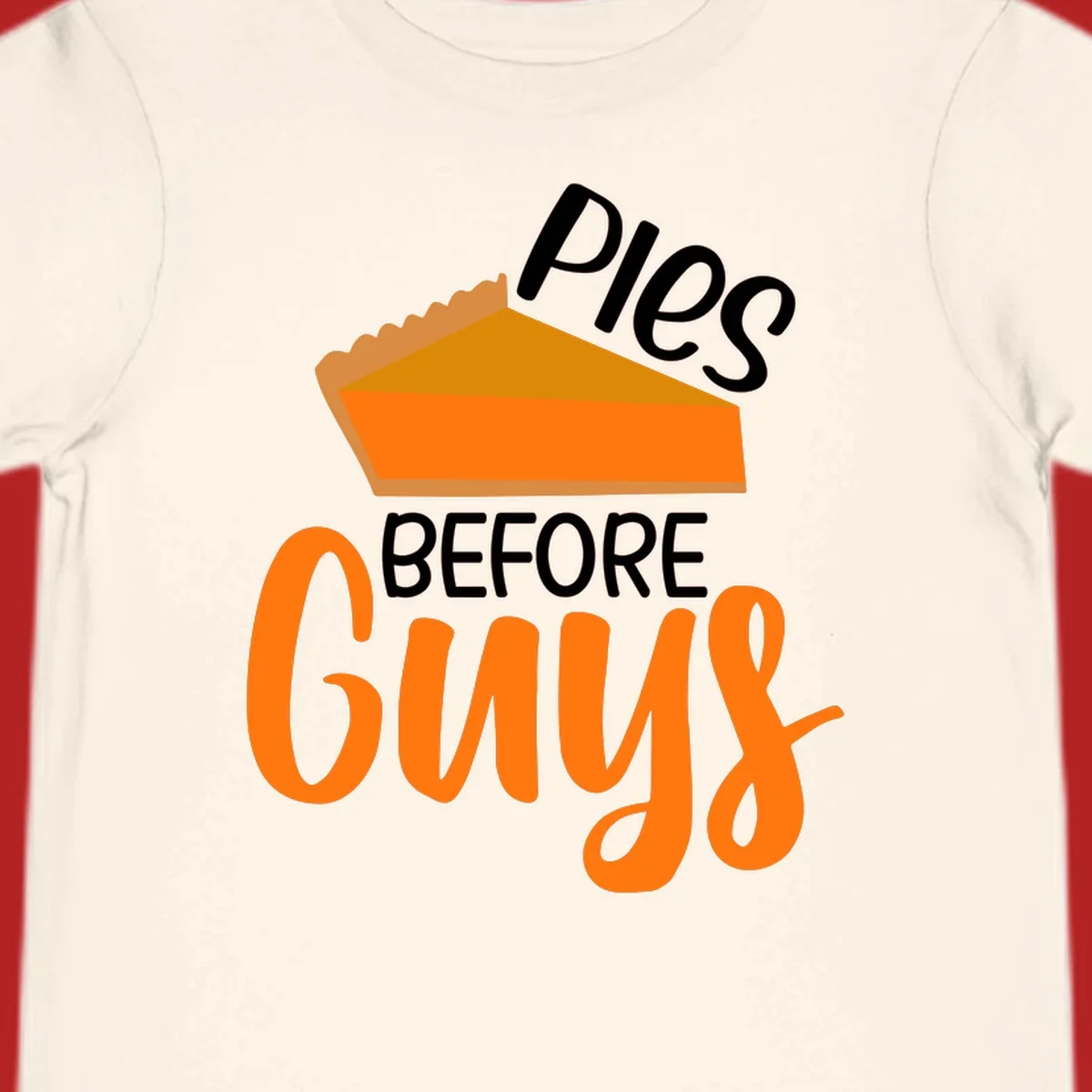 Illustration of a pumpkin pie slice with the text 'Pies BEFORE Guys', a popular Thanksgiving phrase.