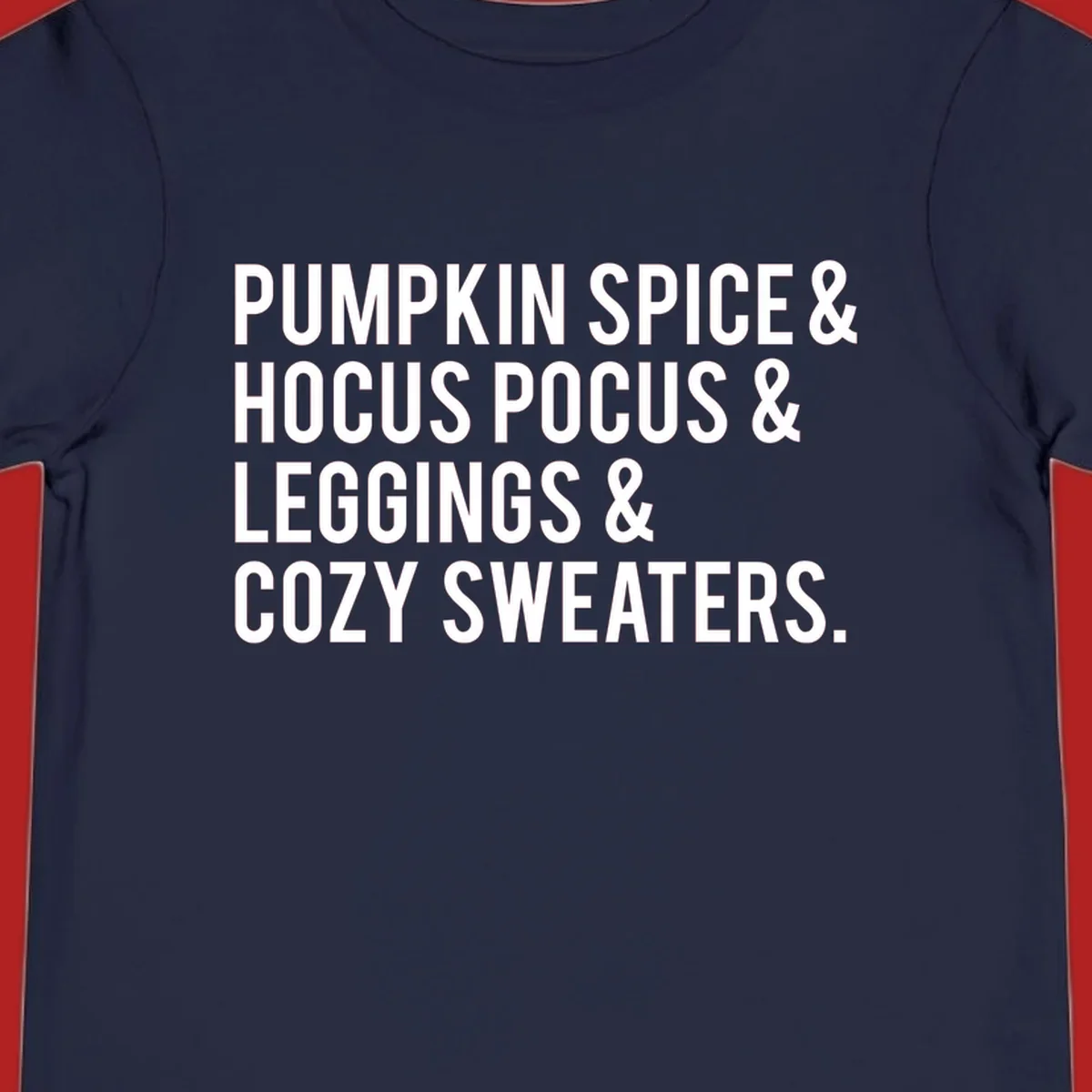 Bold white text listing fall favorites: pumpkin spice, hocus pocus, leggings, cozy sweaters.
