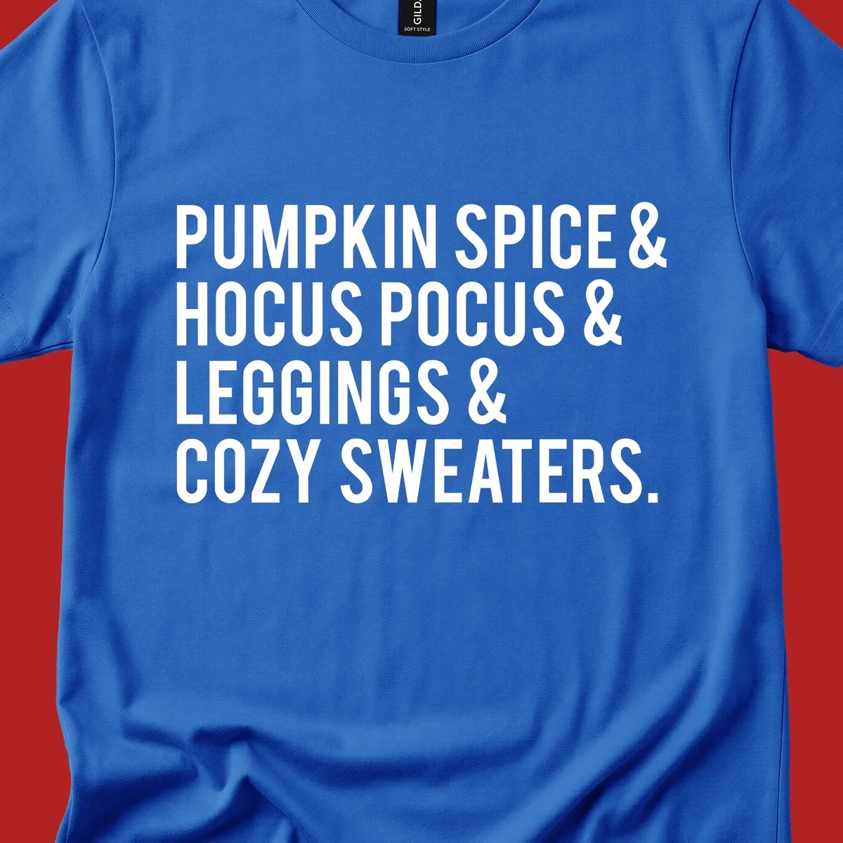 Bold white text listing fall favorites: pumpkin spice, hocus pocus, leggings, cozy sweaters.