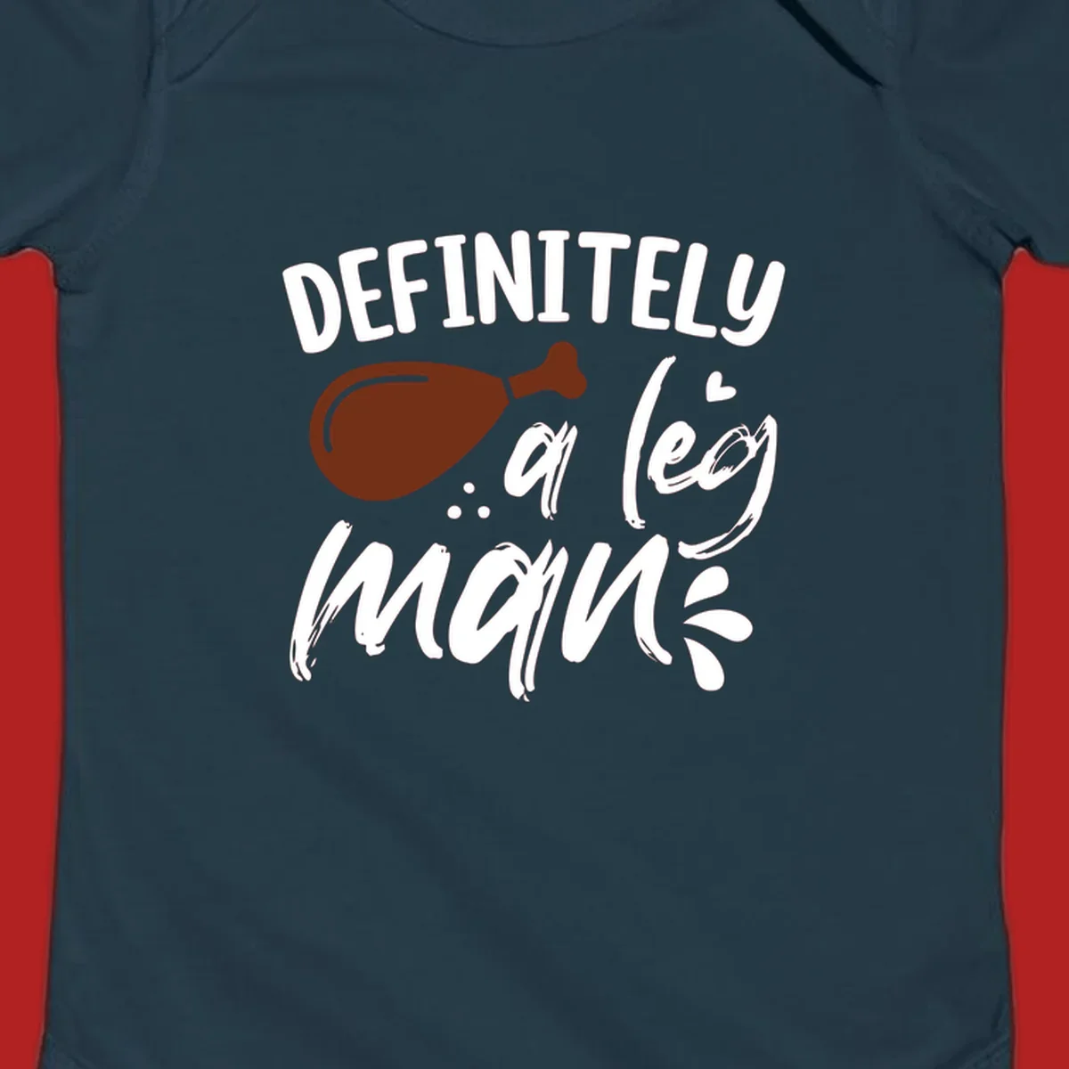 Illustration of a turkey leg with text 'DEFINITELY a leg man', for Thanksgiving.