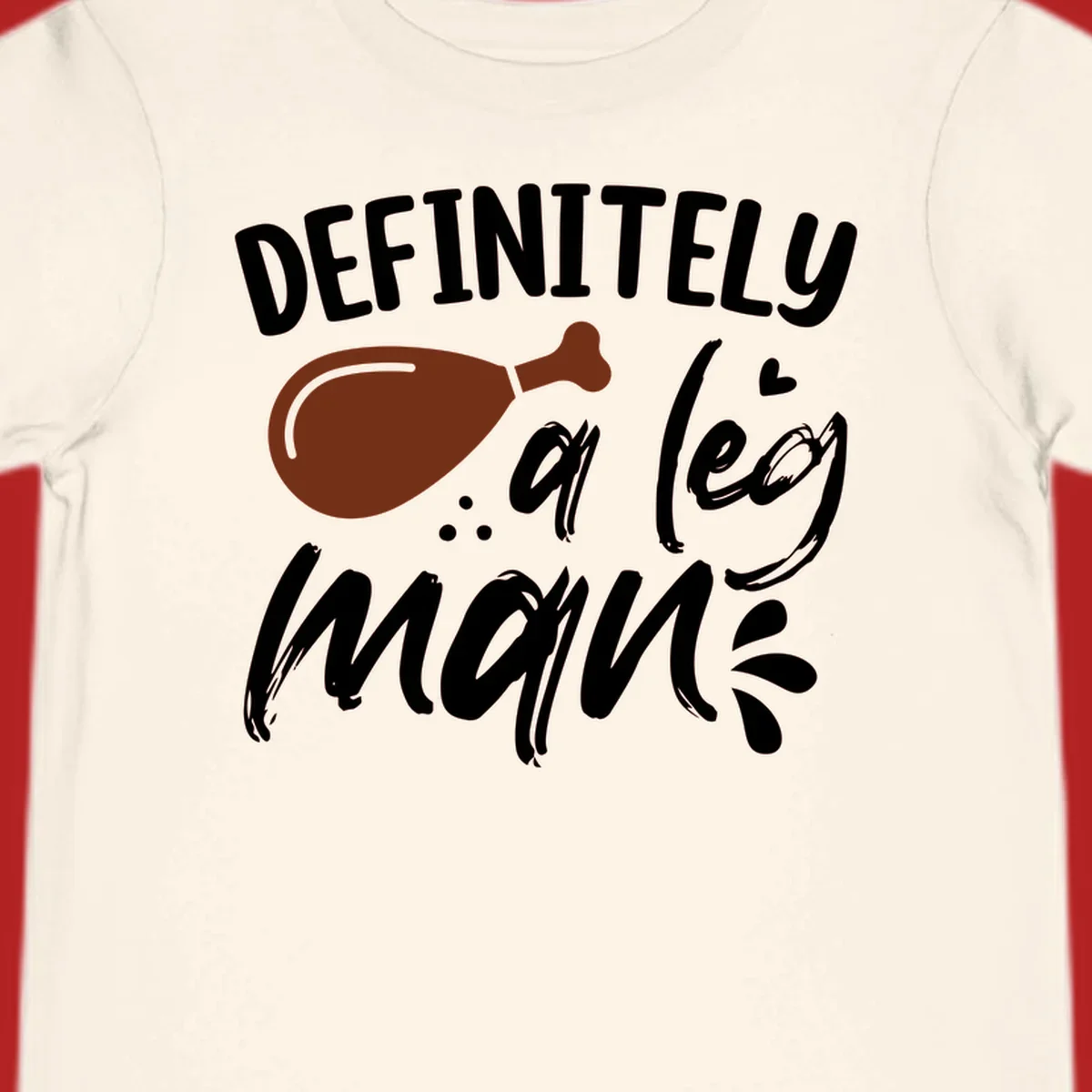 Illustration of a turkey leg with text 'DEFINITELY a leg man', for Thanksgiving.
