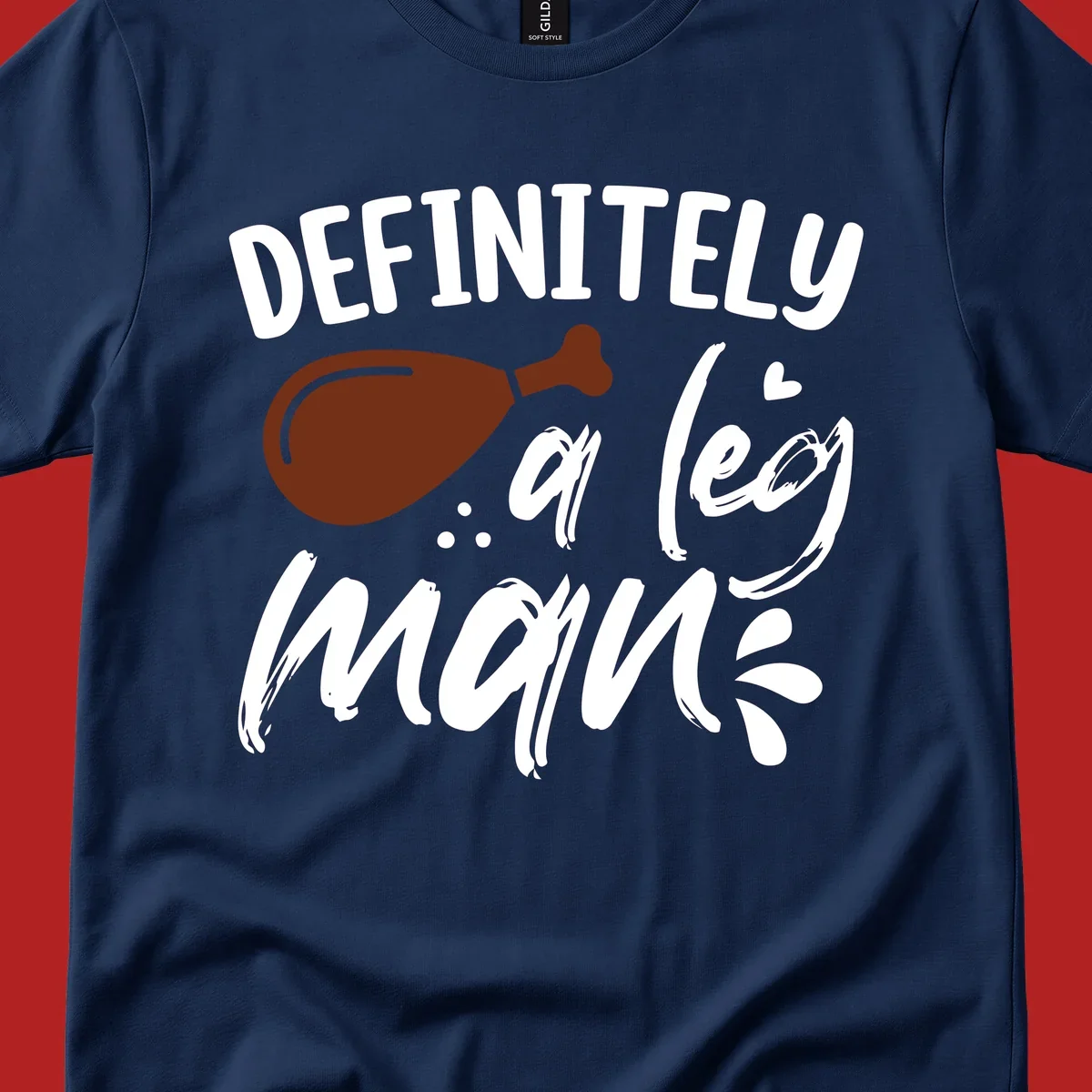 Illustration of a turkey leg with text 'DEFINITELY a leg man', for Thanksgiving.
