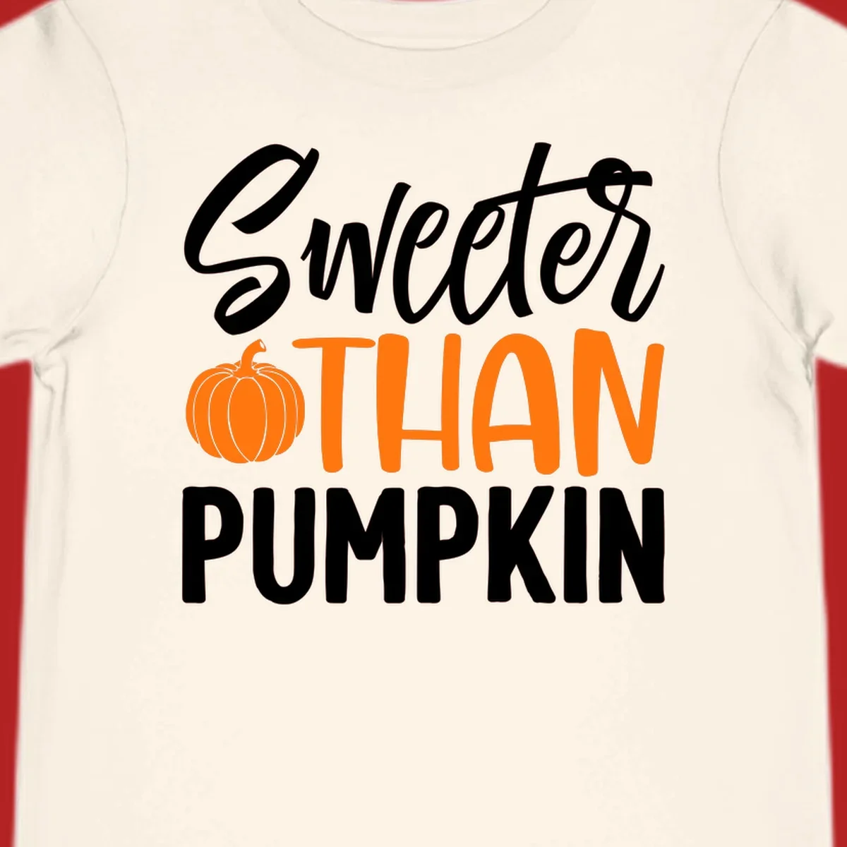 Sweeter than pumpkin fall saying with pumpkin illustration and text.