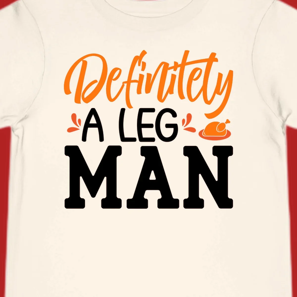 Thanksgiving Leg Man typography design with a roasted turkey illustration. Orange and white text on black.