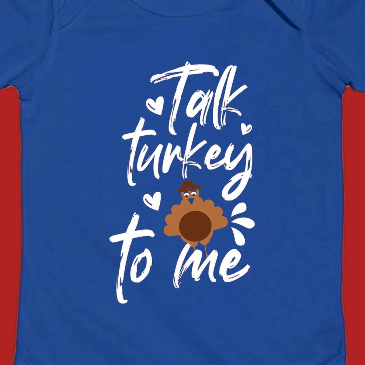 Talk turkey to me Thanksgiving graphic with a cute turkey and hearts.