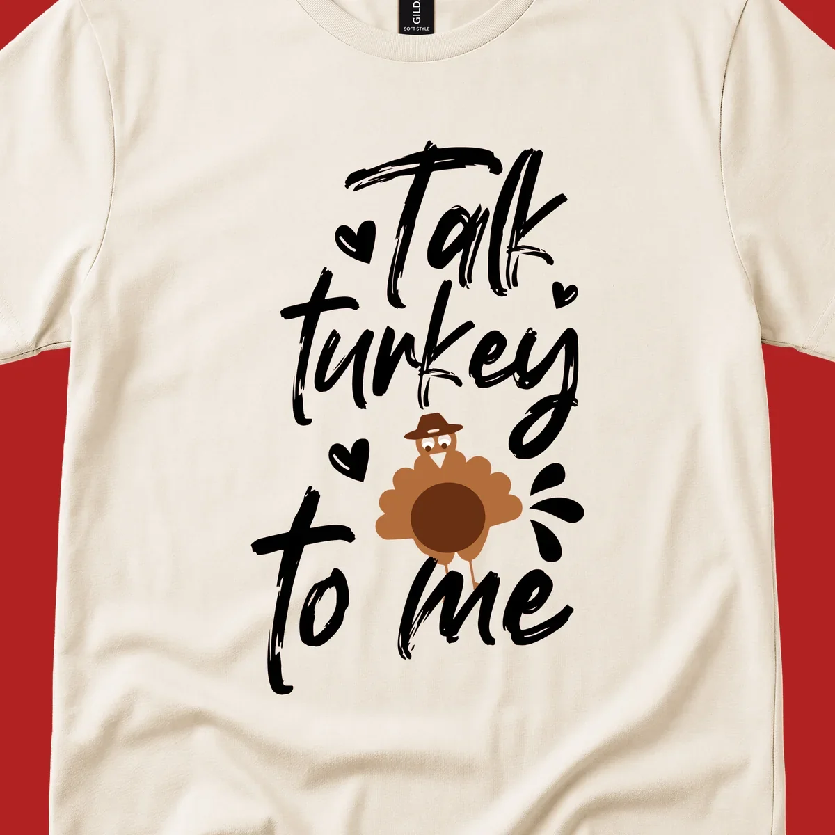 Talk turkey to me Thanksgiving graphic with a cute turkey and hearts.