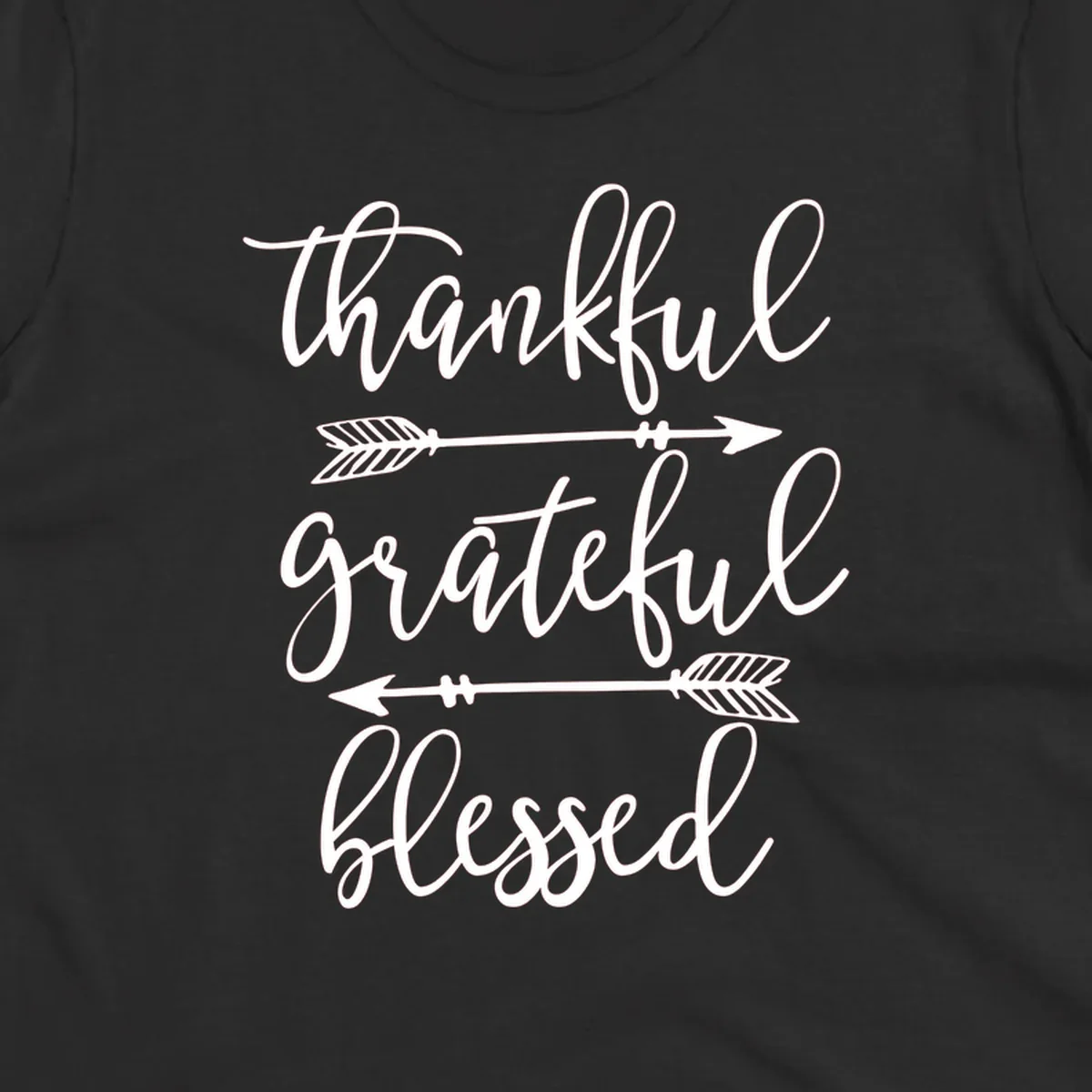 Thankful grateful blessed typography design with arrows on black and white backgrounds.