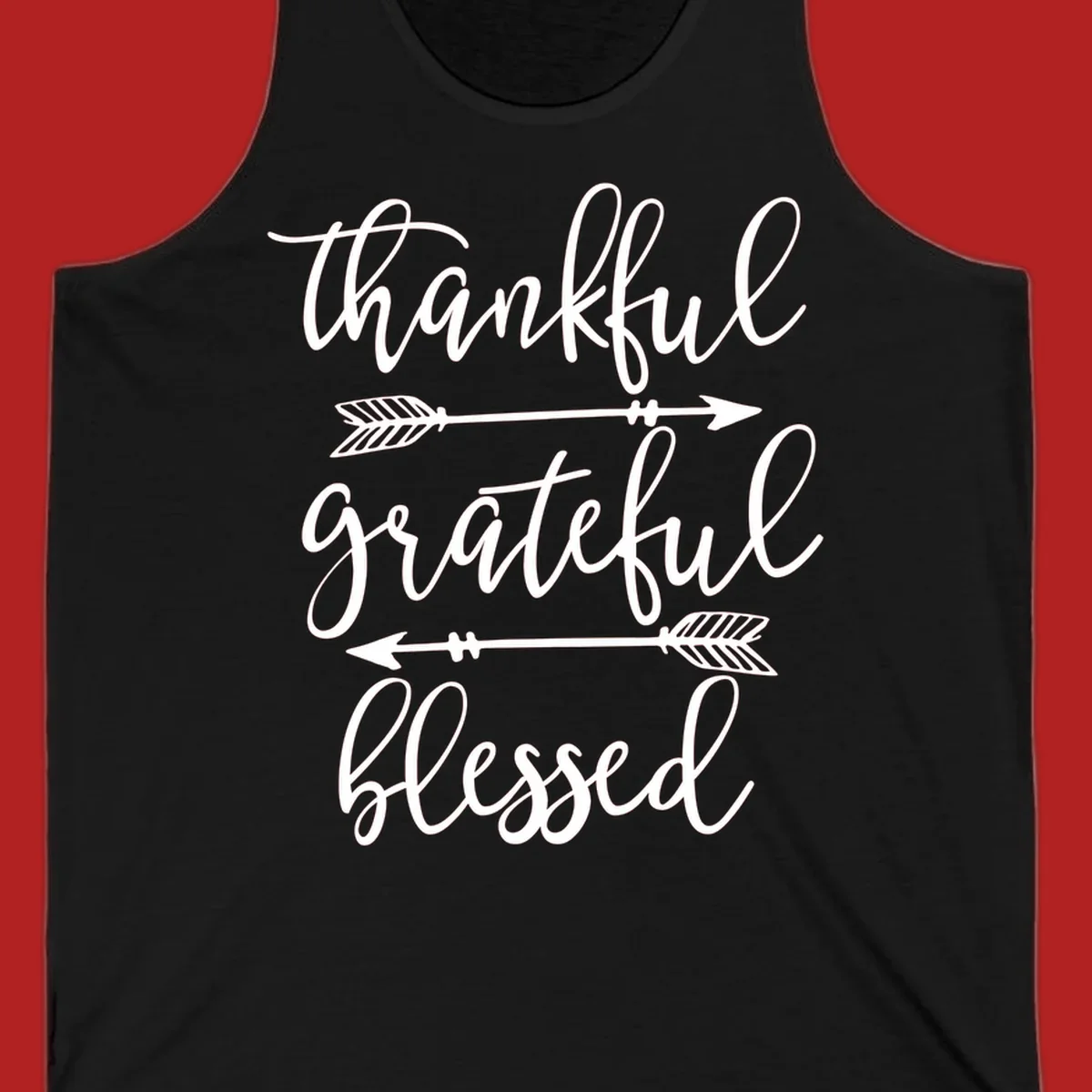 Thankful grateful blessed typography design with arrows on black and white backgrounds.