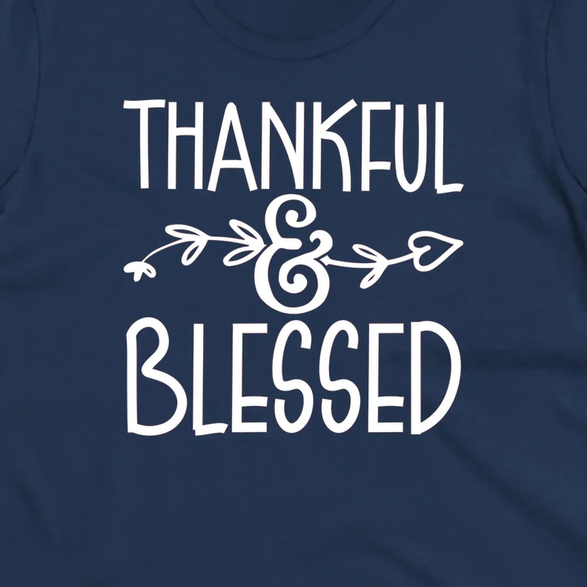 Thankful & Blessed typography design with decorative ampersand.