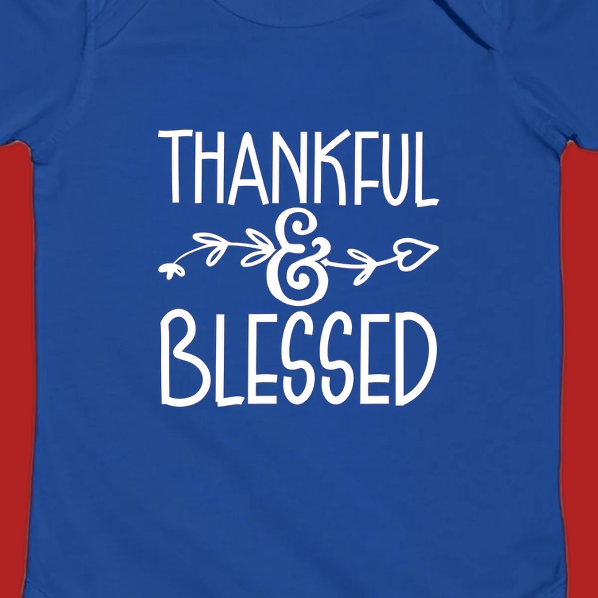 Thankful & Blessed typography design with decorative ampersand.