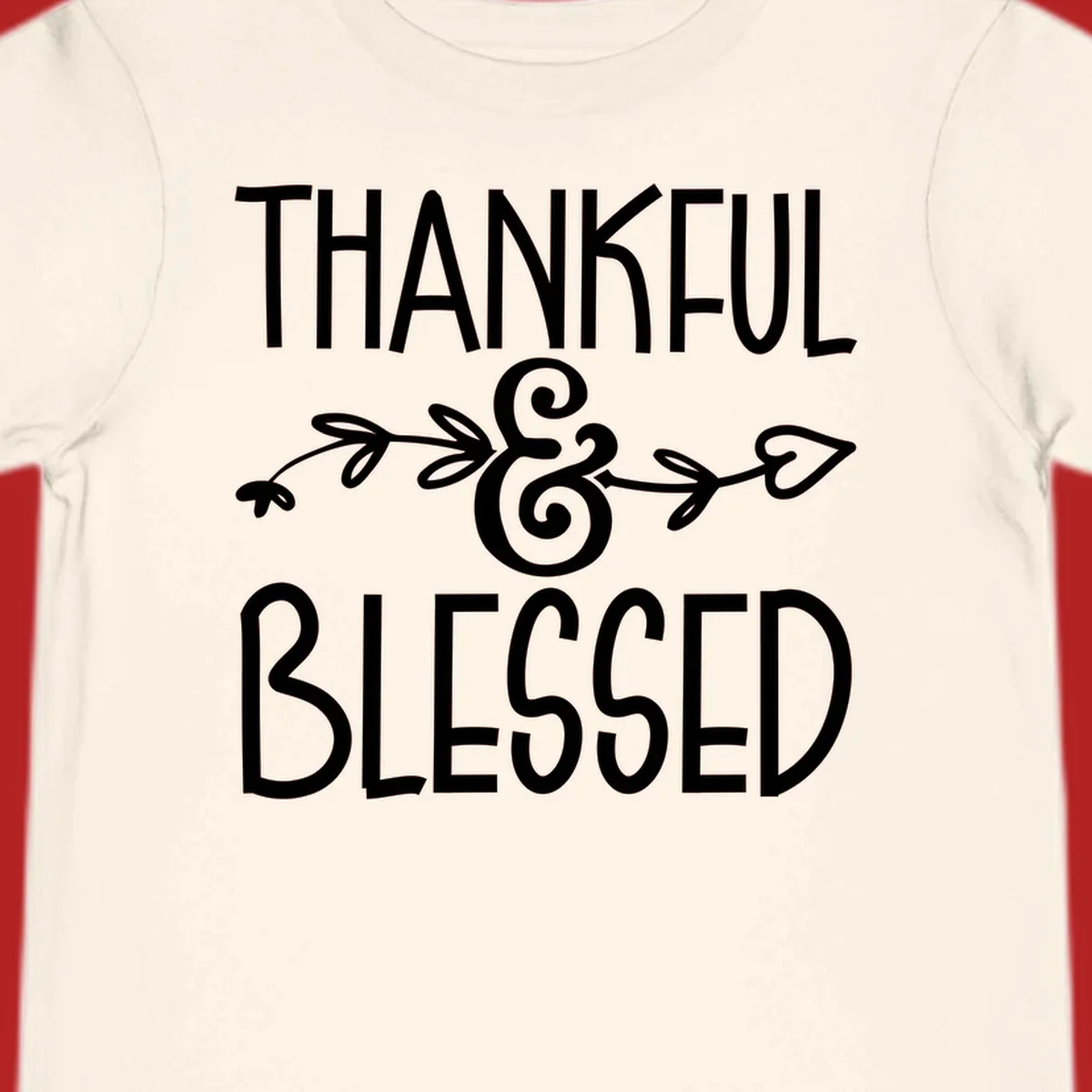 Thankful & Blessed typography design with decorative ampersand.