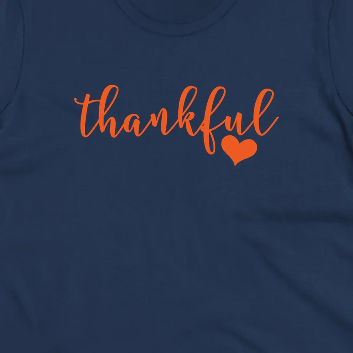 Orange script text 'thankful' with a heart accent, thankful-heart-script.