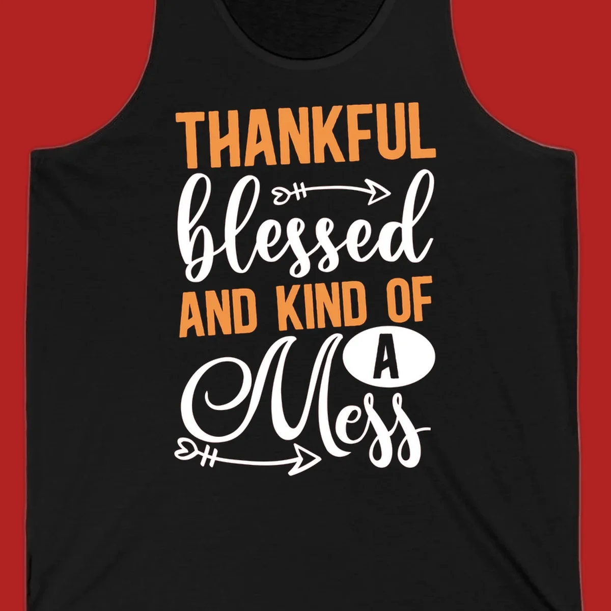 Thankful Blessed And Kind Of A Mess typography design with orange and white text on black background.