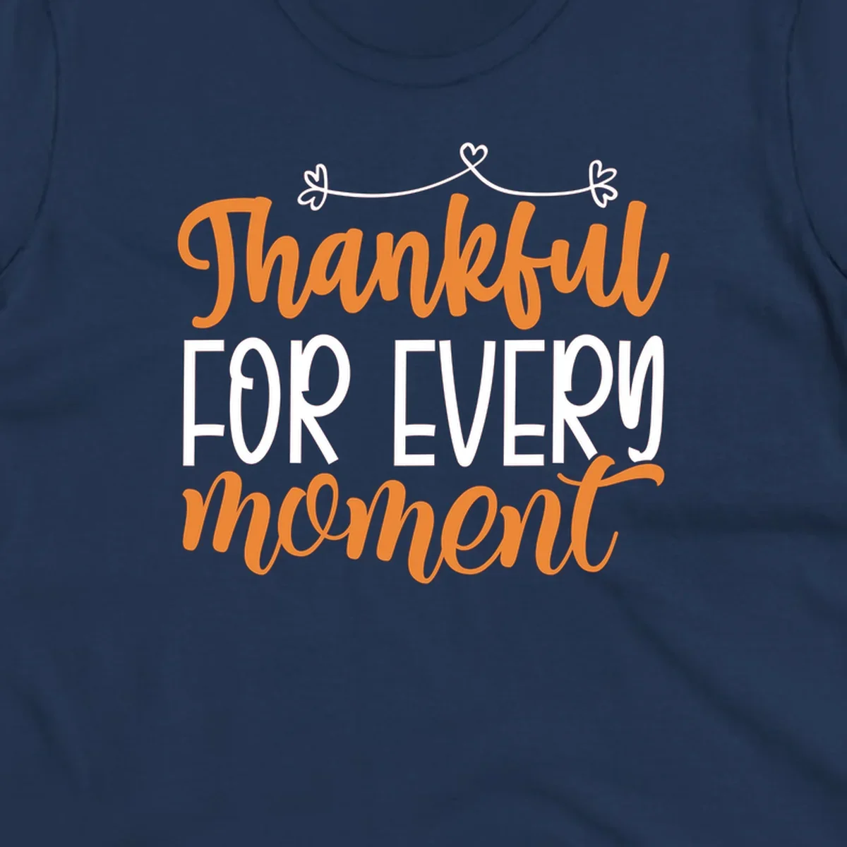 Thankful for every moment text design with orange and white lettering on black background.