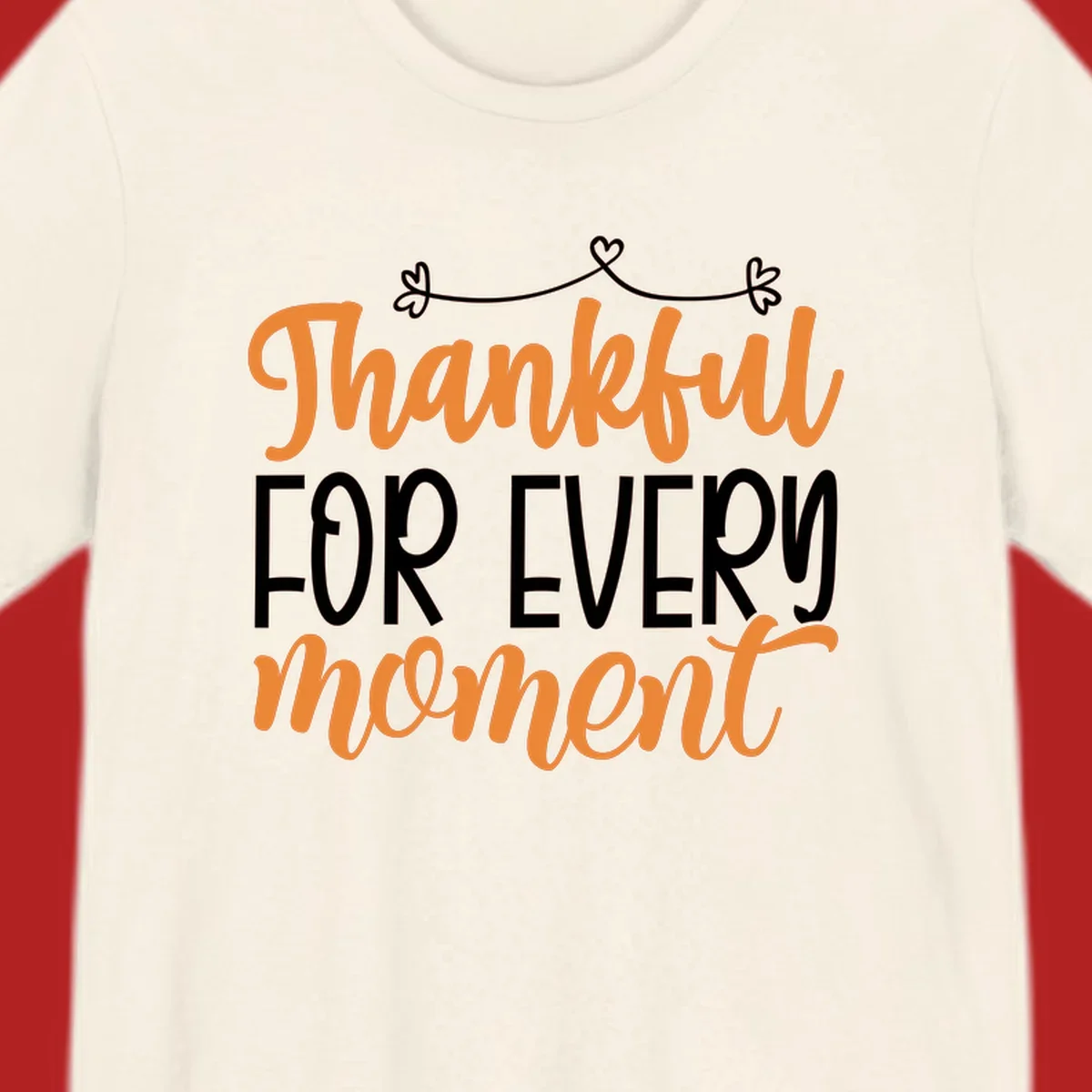 Thankful for every moment text design with orange and white lettering on black background.