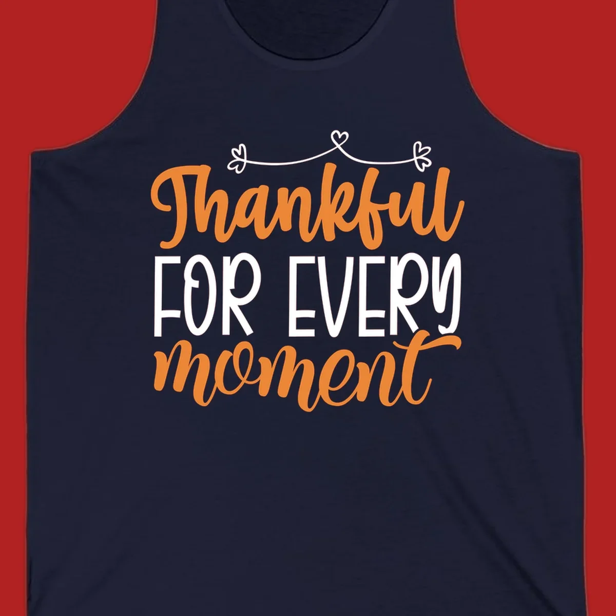 Thankful for every moment text design with orange and white lettering on black background.