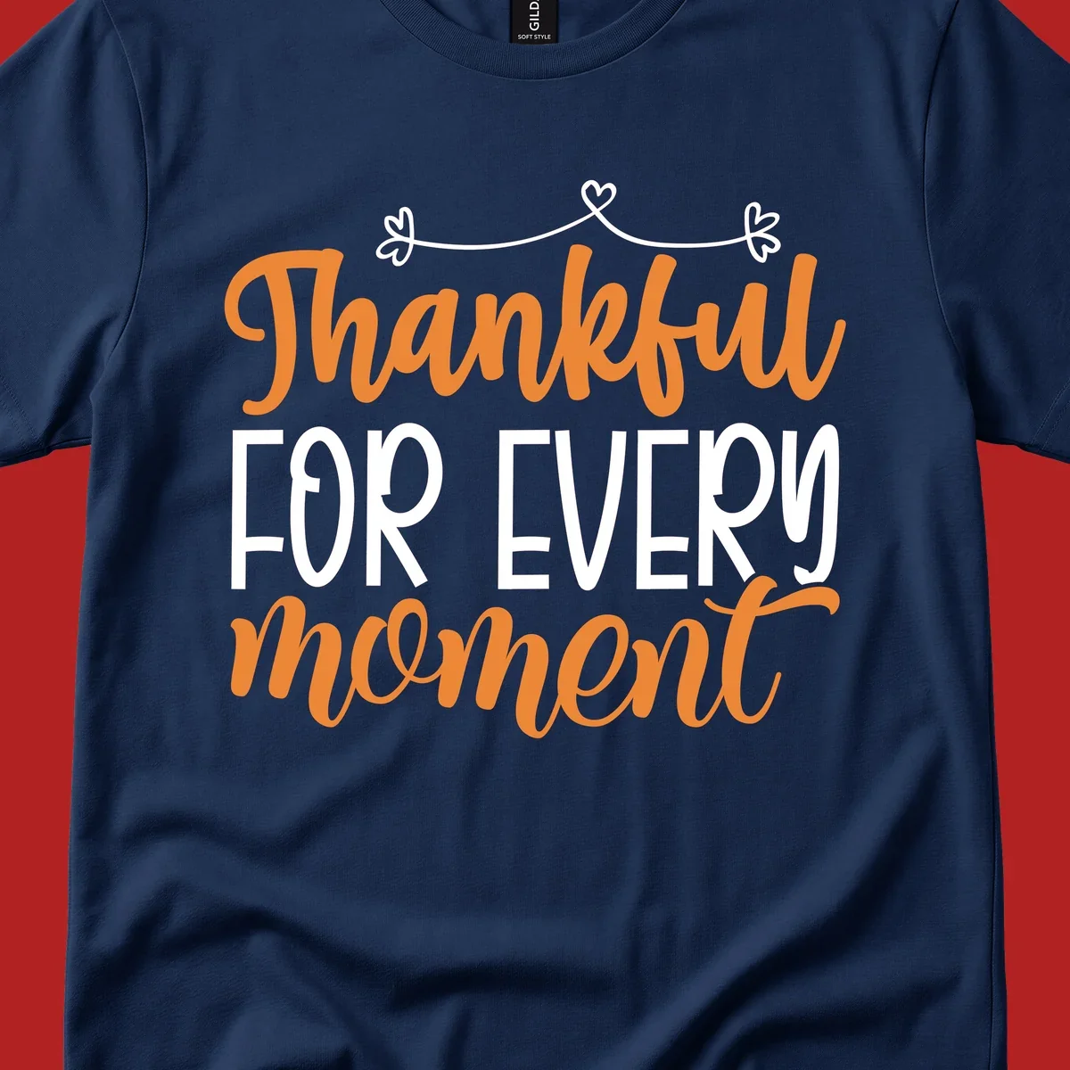 Thankful for every moment text design with orange and white lettering on black background.