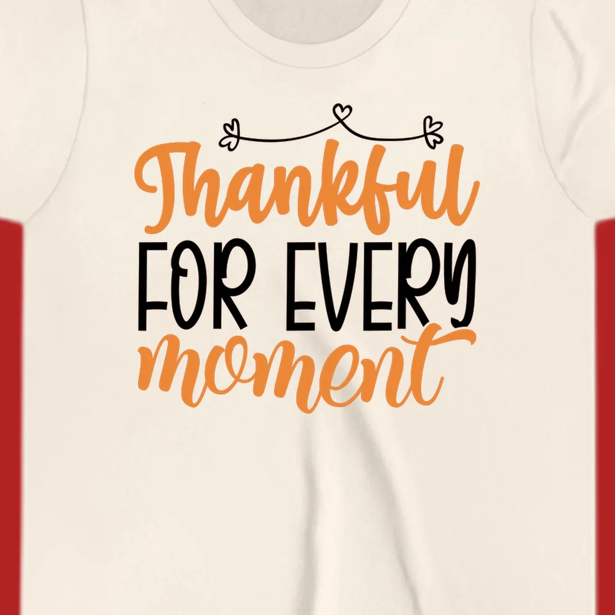 Thankful for every moment text design with orange and white lettering on black background.