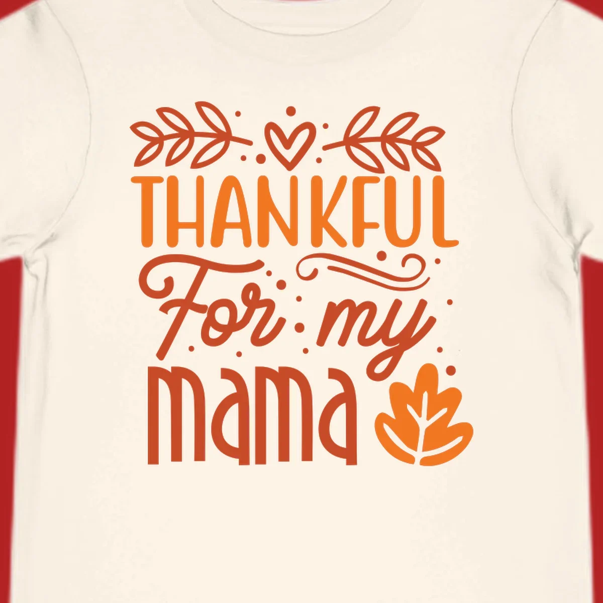 Thankful For My Mama typography design with fall leaves and heart.