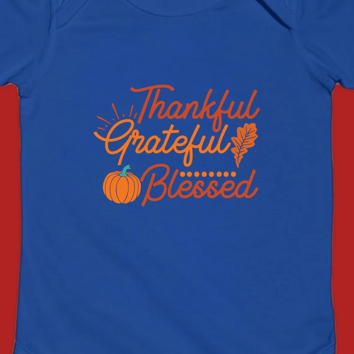 Thankful Grateful Blessed Thanksgiving design with pumpkin and oak leaf.