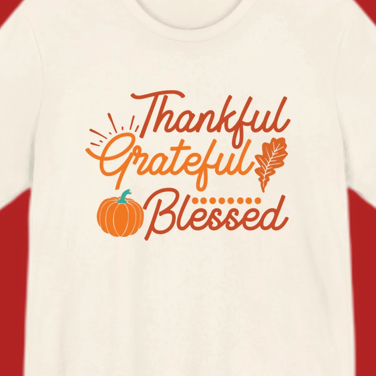 Thankful Grateful Blessed Thanksgiving design with pumpkin and oak leaf.