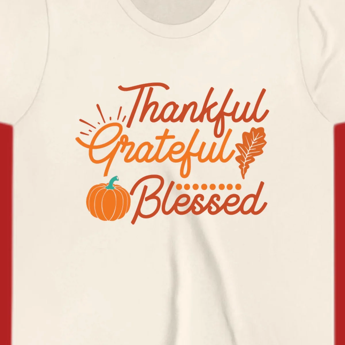 Thankful Grateful Blessed Thanksgiving design with pumpkin and oak leaf.