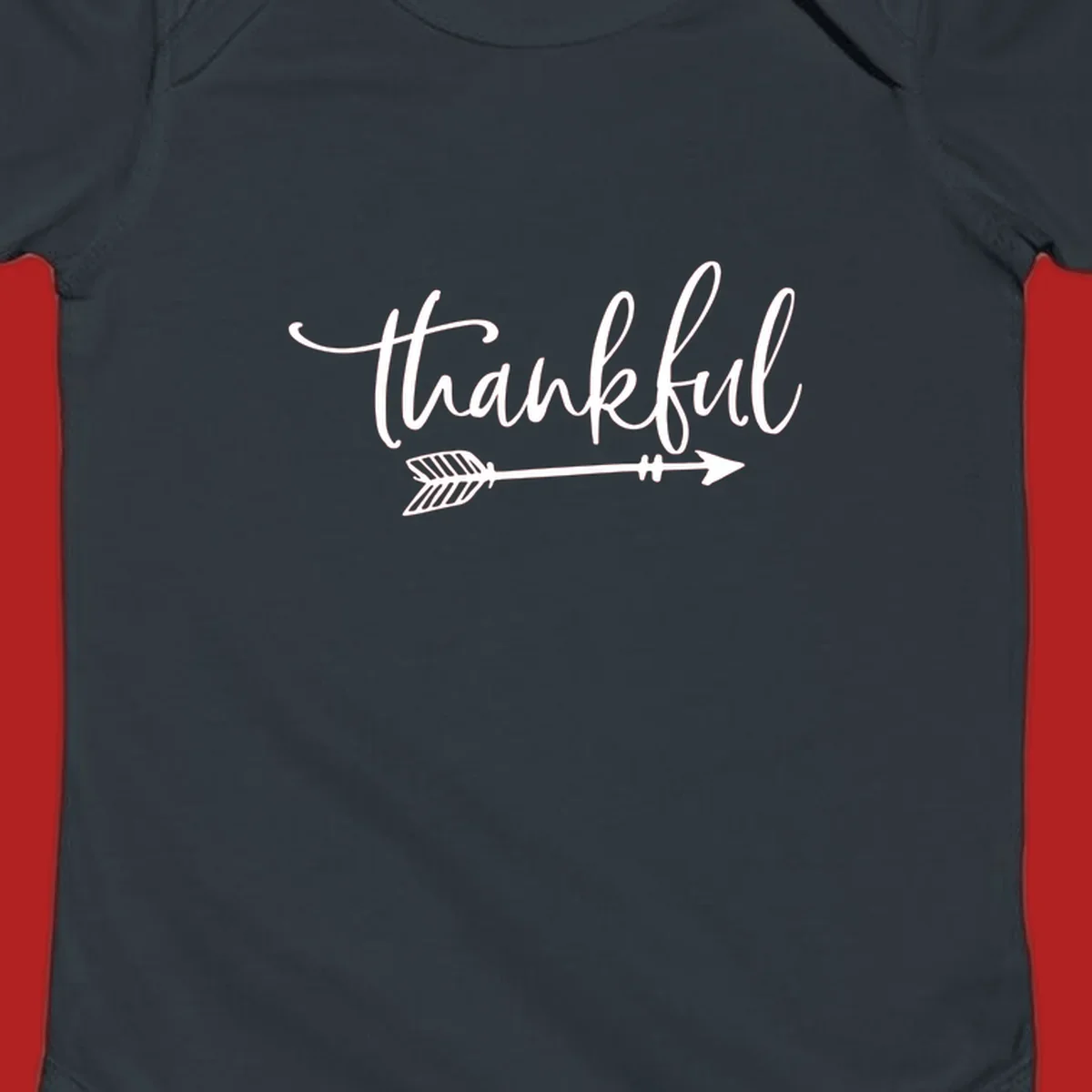 Thankful text with arrow graphic.