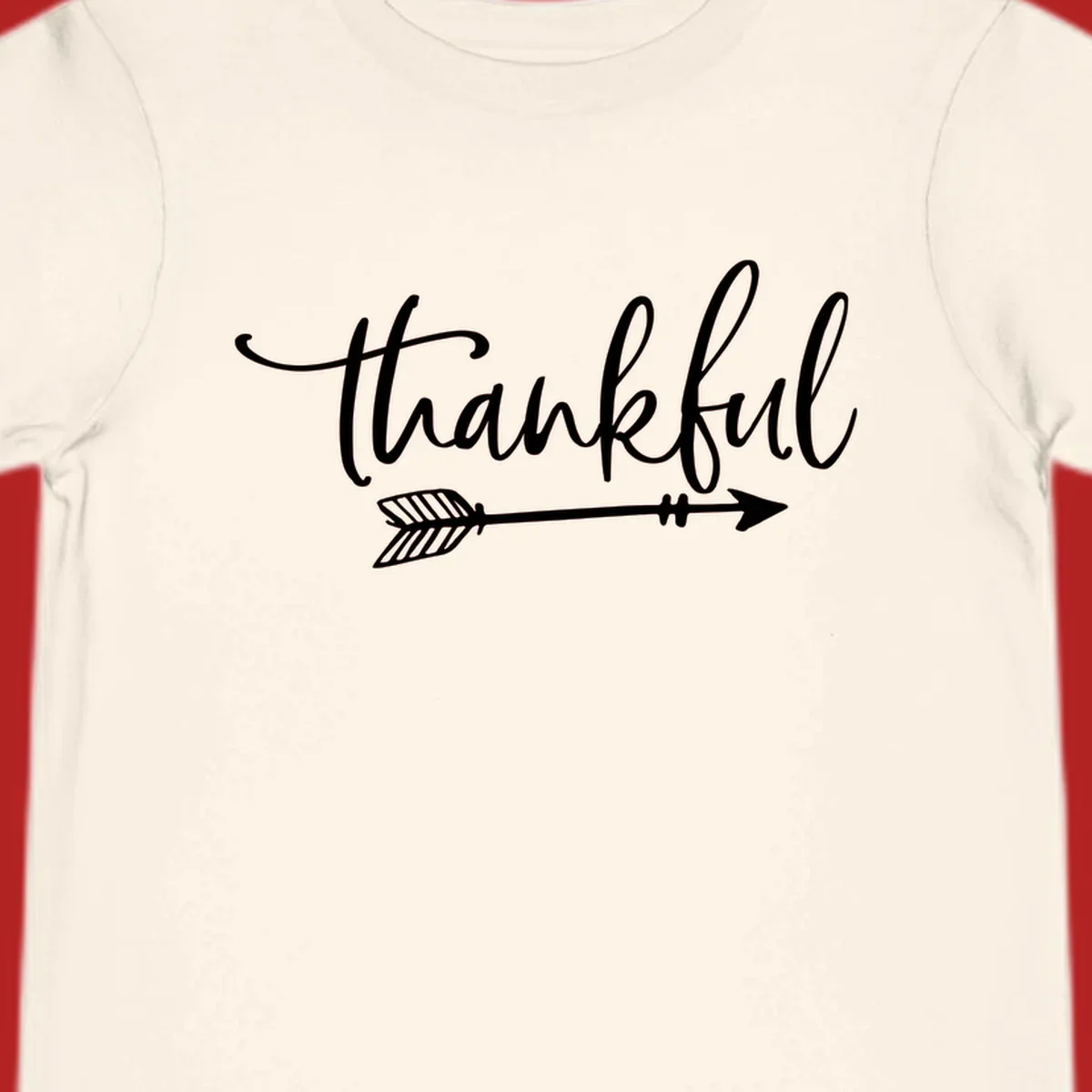 Thankful text with arrow graphic.