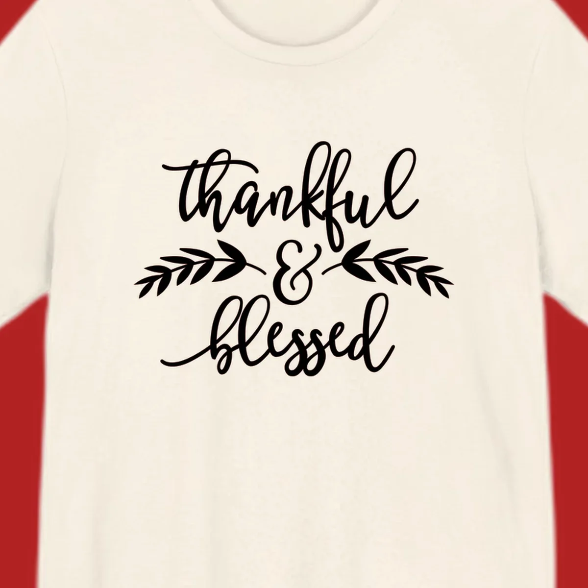 Thankful and Blessed script text with decorative leaves.