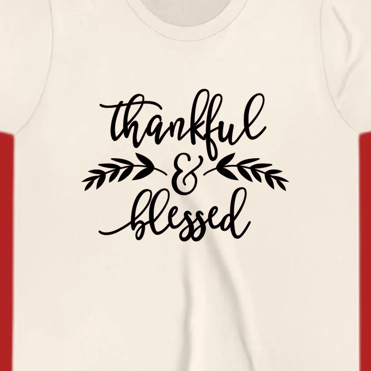 Thankful and Blessed script text with decorative leaves.