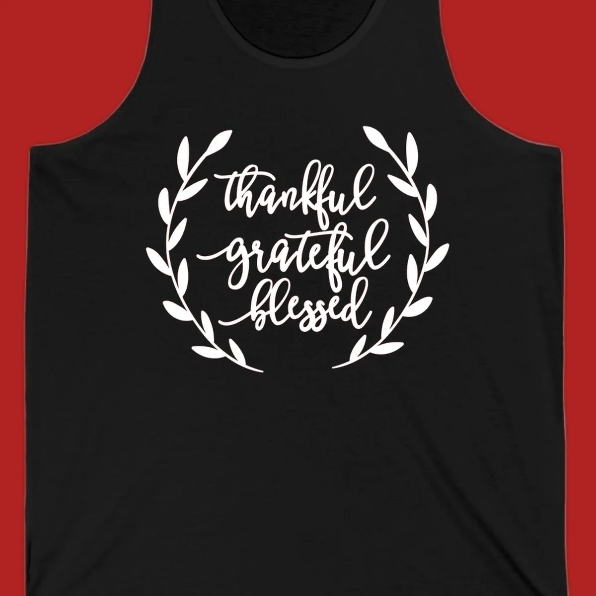 Thankful grateful blessed text inside a wreath graphic.