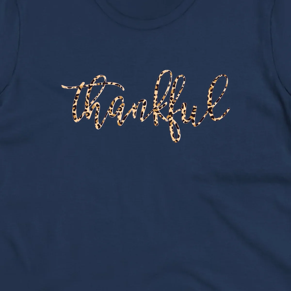 Thankful text in leopard print with a white outline.