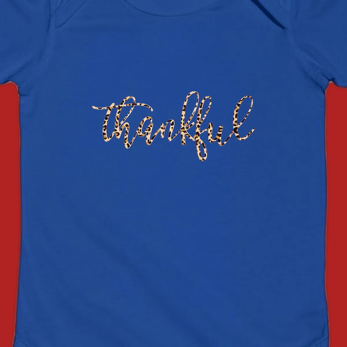 Thankful text in leopard print with a white outline.