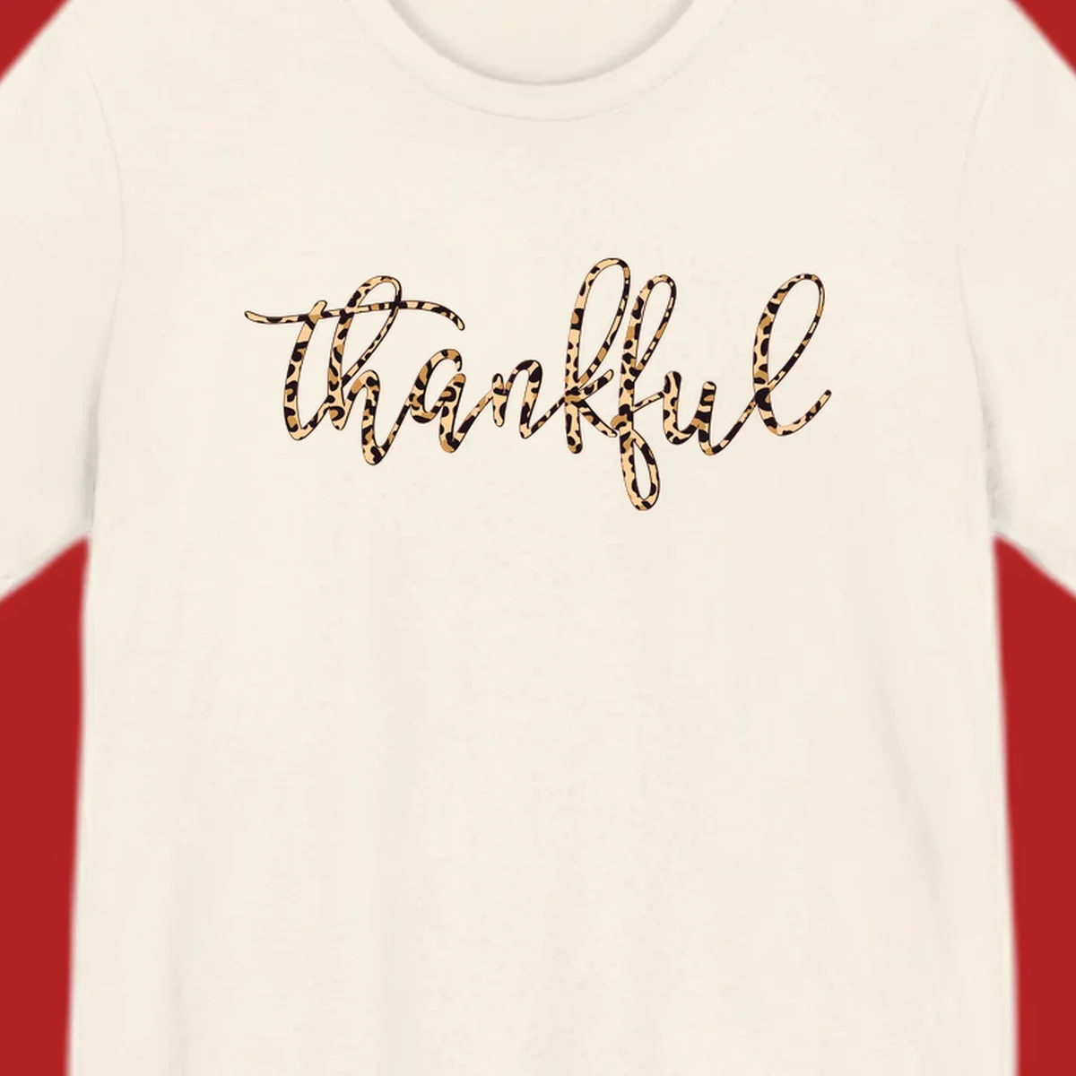Thankful text in leopard print with a white outline.