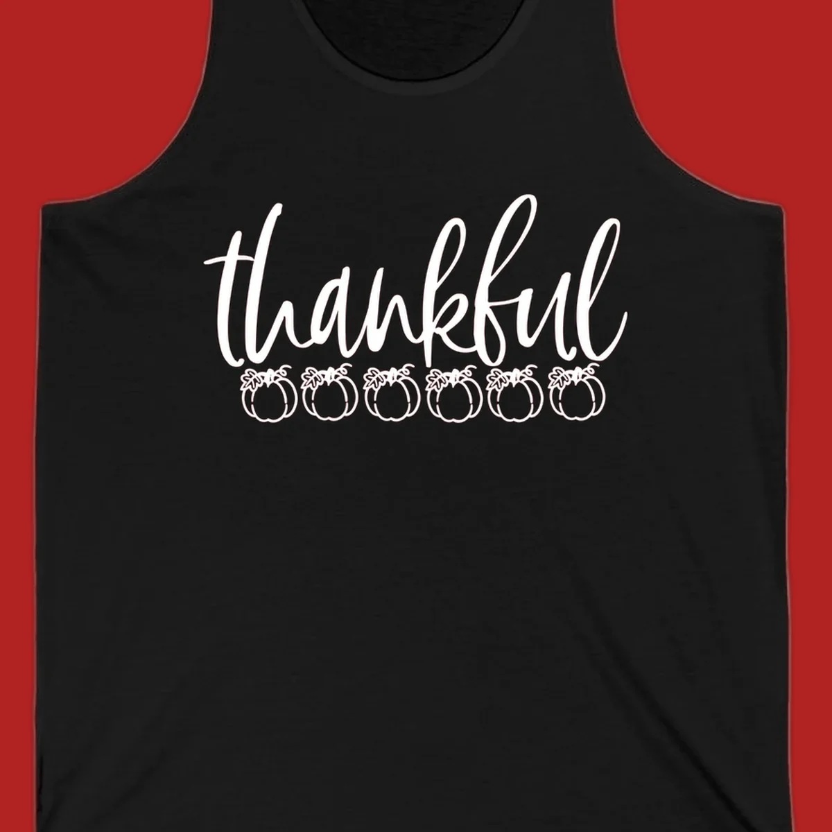 White script text 'thankful' above six white pumpkin illustrations, thankful pumpkins thanksgiving